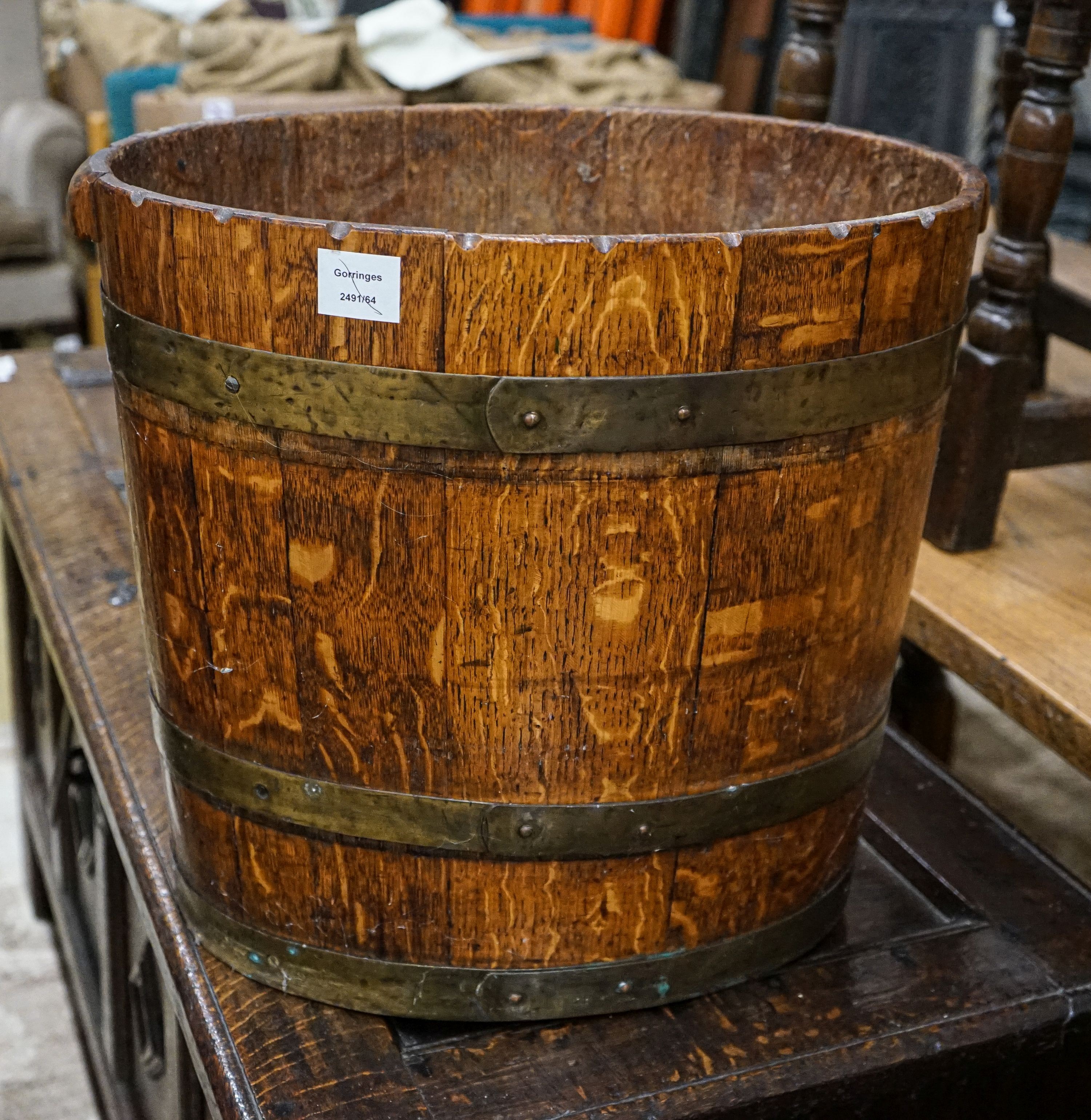 A brass bound staved oak log bin, width 52cm, height 46cm